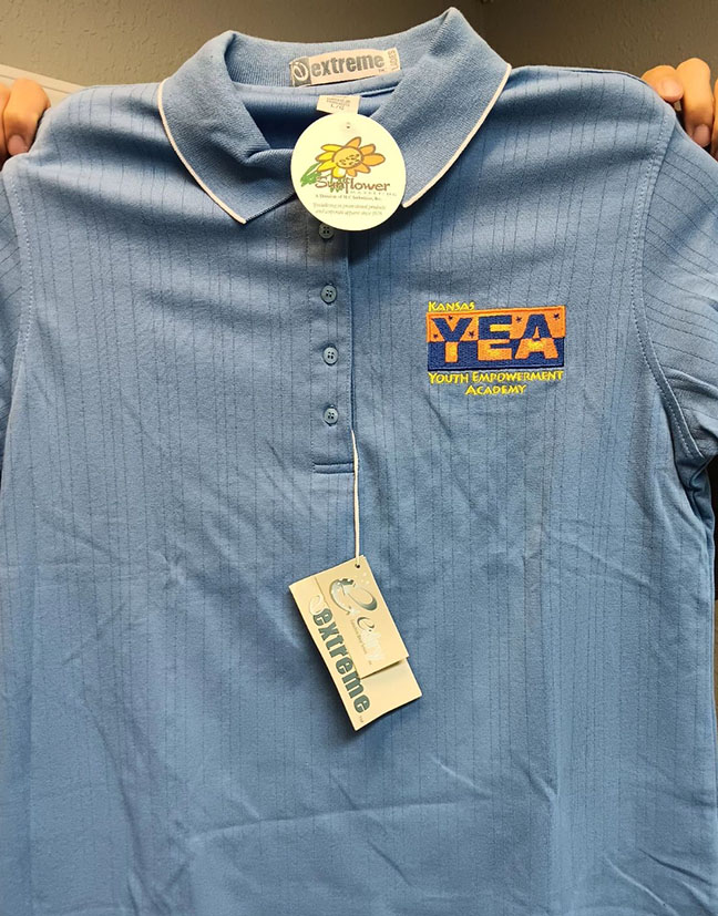 Front of KYEA darker polo- full description below photo